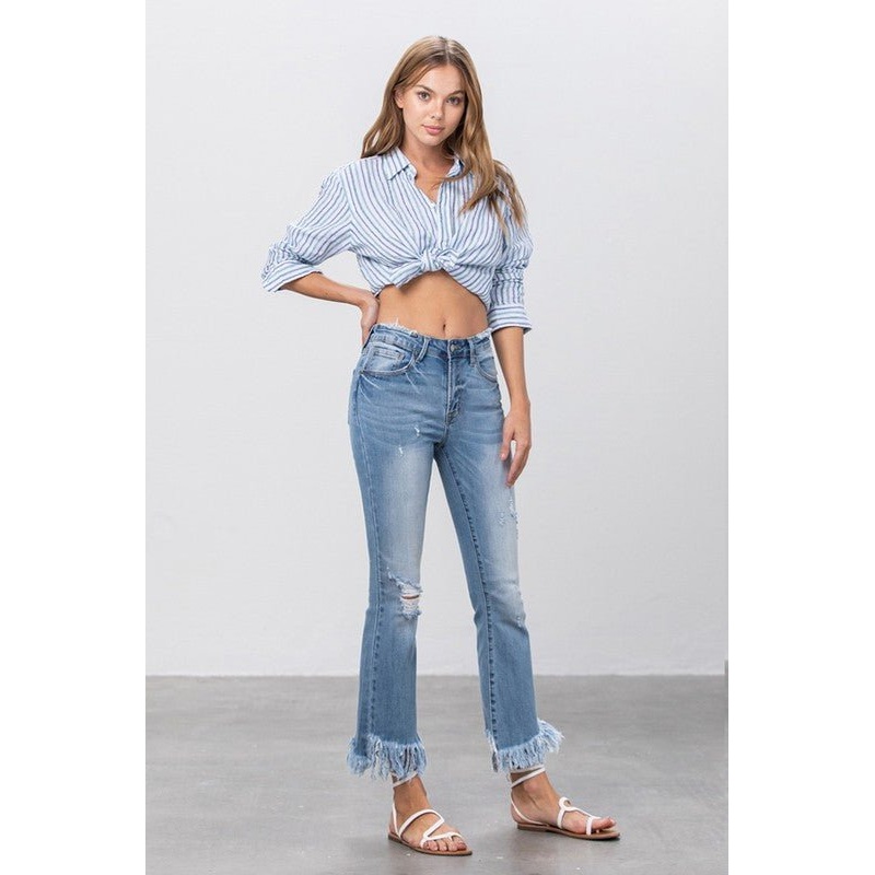 MID RISE LONG BOTTOM FRAYED CROP FLARE